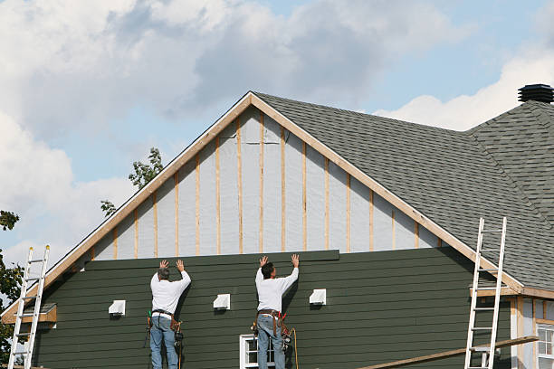 Professional Vinyl Siding technician working in Cumming, GA